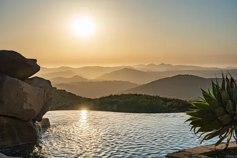 a view of ocean and mountain