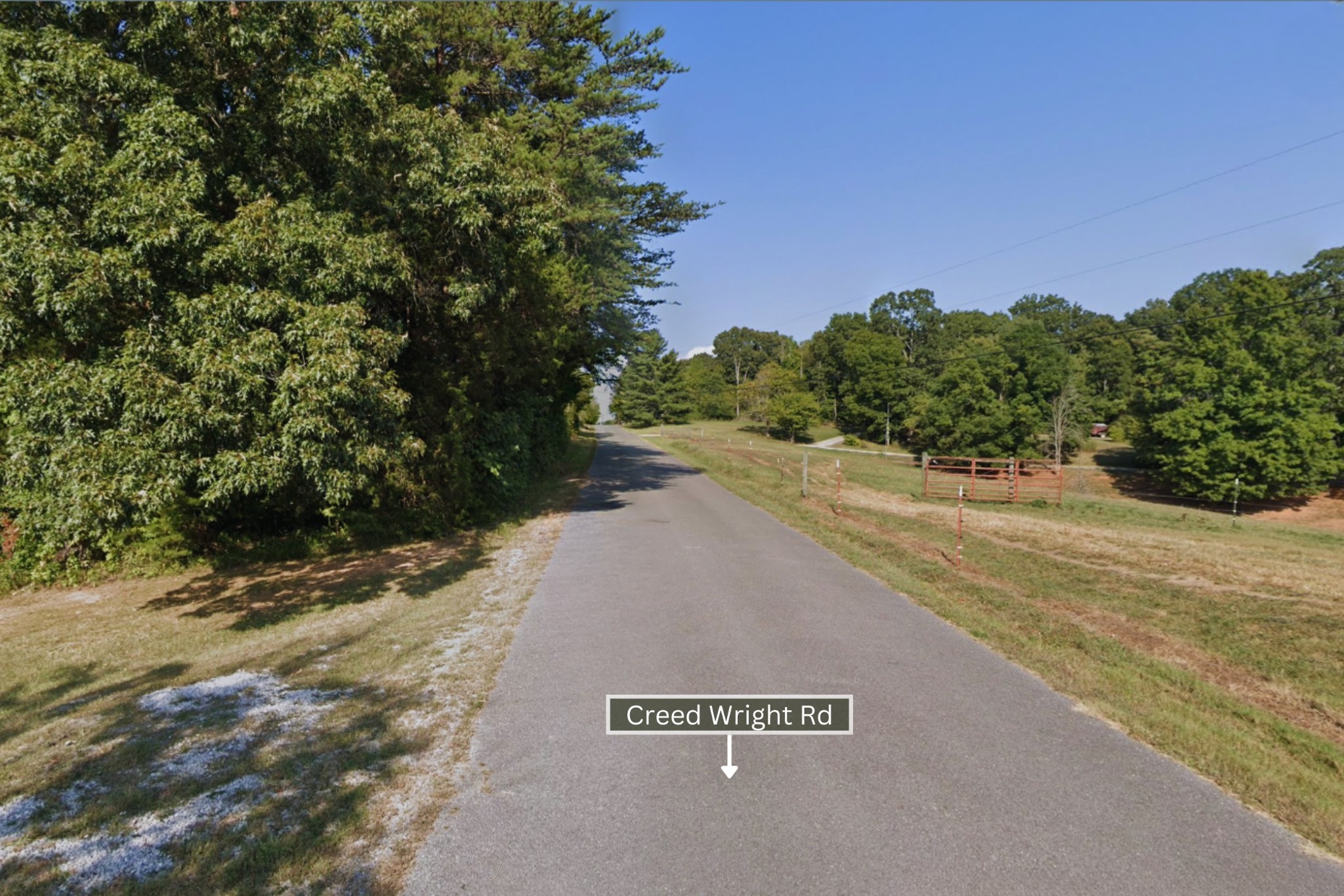 0 Creed Wright Road Walling, TN 38587 - Photo 11 of 34 a view of a street with a trees in the background
