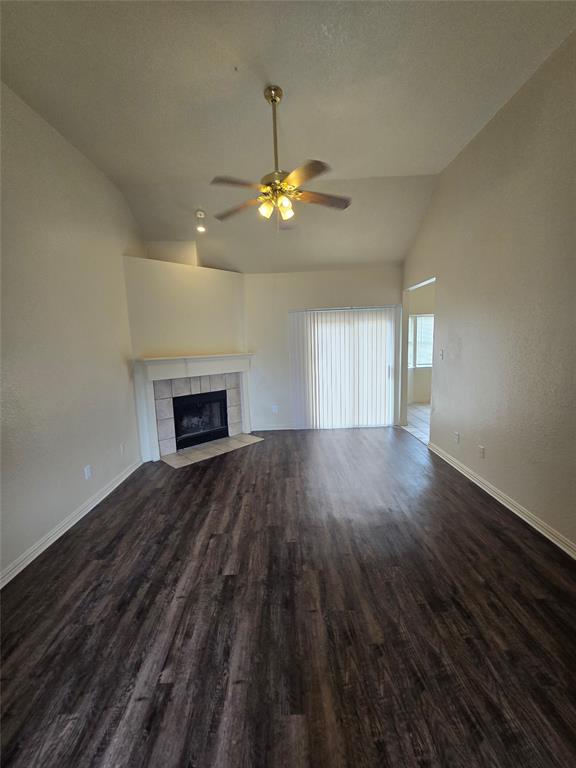 3038 Flask Drive Dallas, TX 75241 - Photo 2 of 12 a view of empty room with wooden floor and fan