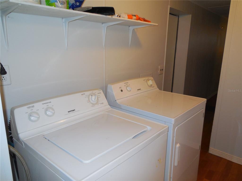 1007 Sparrow Road Wauchula, FL 33873 - Photo 13 of 42 a utility room with dryer and washer