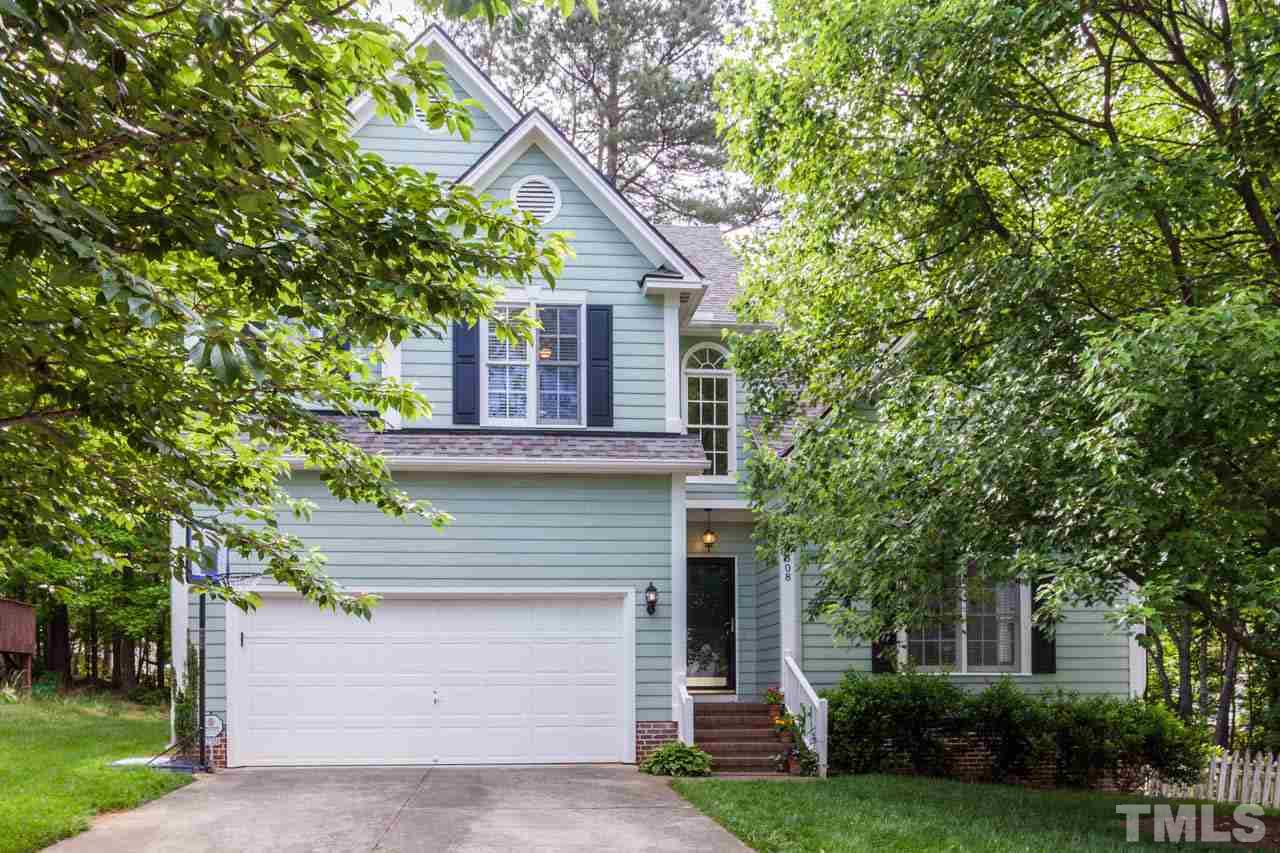 12308 Hartwick Court Raleigh, NC 27613 - Photo 1 of 20 front view of a house with a tree