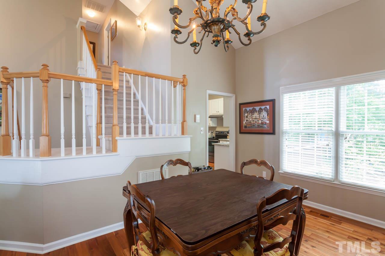 12308 Hartwick Court Raleigh, NC 27613 - Photo 10 of 20 a view of a dining room with furniture window and outside view