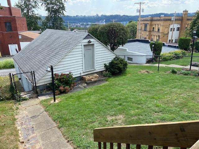 429 East Washington Street Rochester, PA 15074 - Photo 13 of 15 a view of a house with backyard and a garden