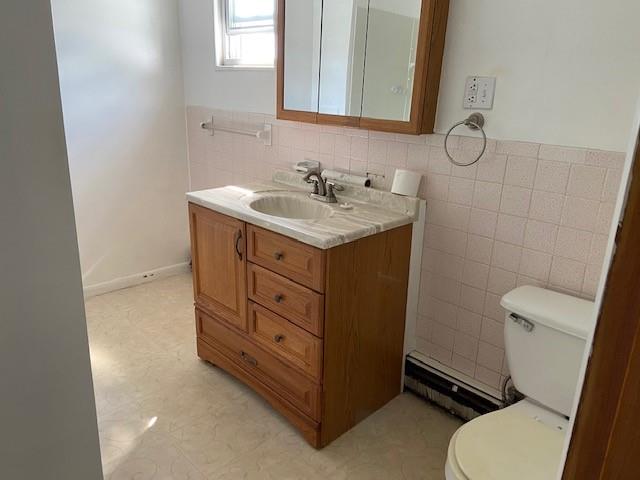 429 East Washington Street Rochester, PA 15074 - Photo 8 of 15 a bathroom with a sink toilet and mirror