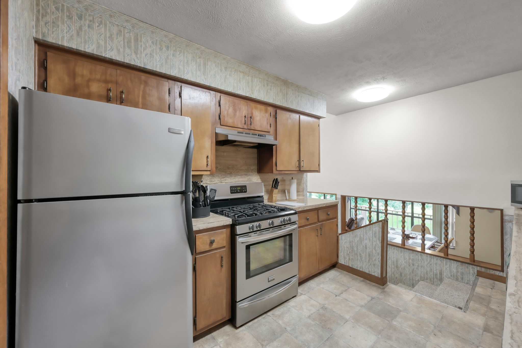 254 Sharp Lane Trinity, TX 75862 - Photo 12 of 36 a kitchen with stainless steel appliances a refrigerator sink and cabinets