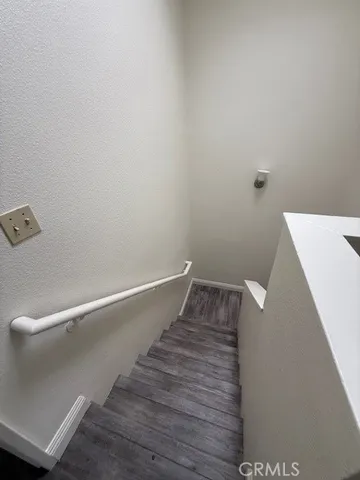 a view of a hallway with staircase