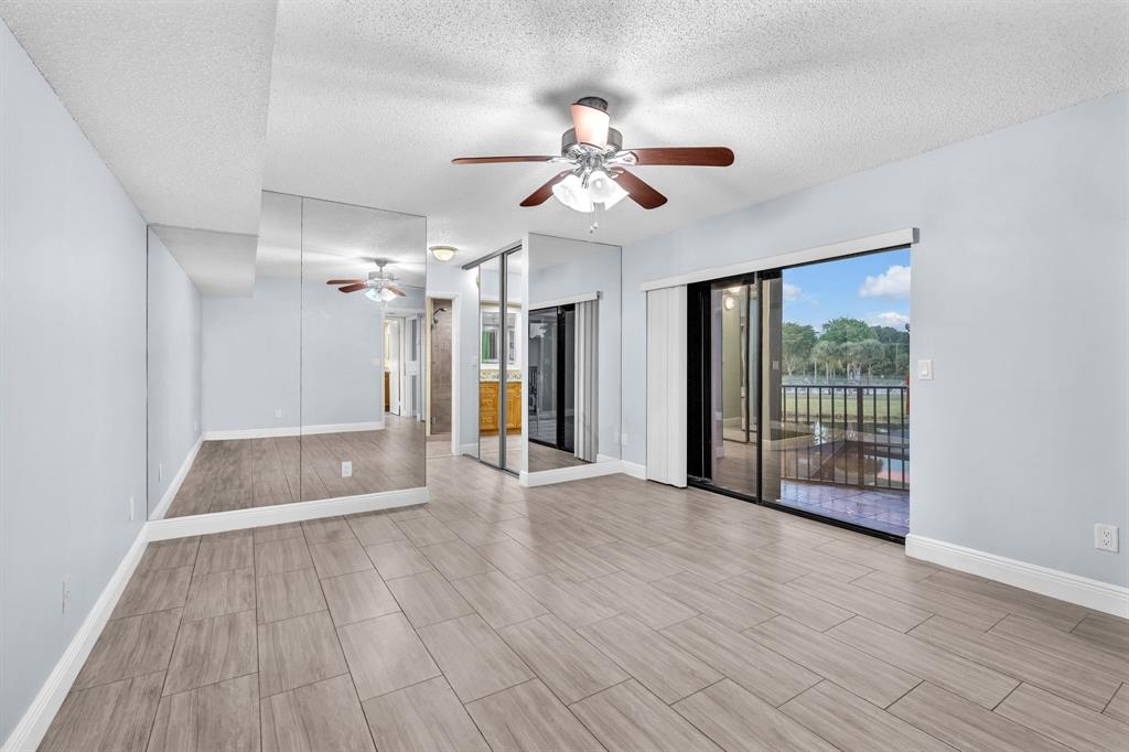 8377 Boca Rio Drive, Unit 8377 Boca Raton, FL 33433 - Photo 19 of 33 MASTER BEDROOM UPSTAIRS