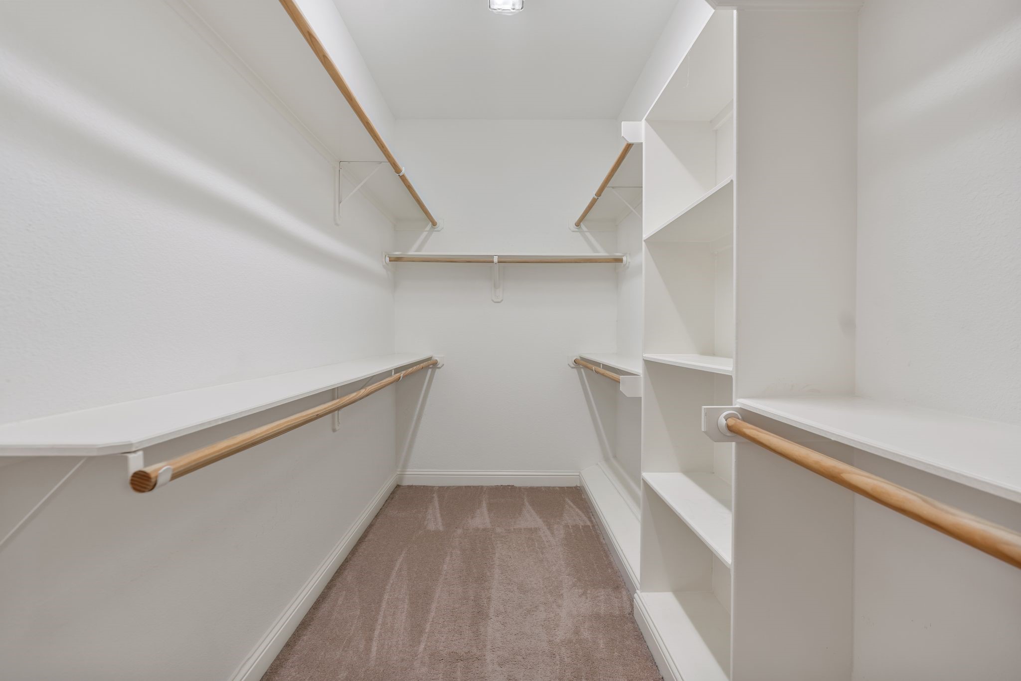 2316 Beall Street Houston, TX 77008 - Photo 16 of 30 Walk in closet with custom shelving, including slanted shoe storage with built in ridges