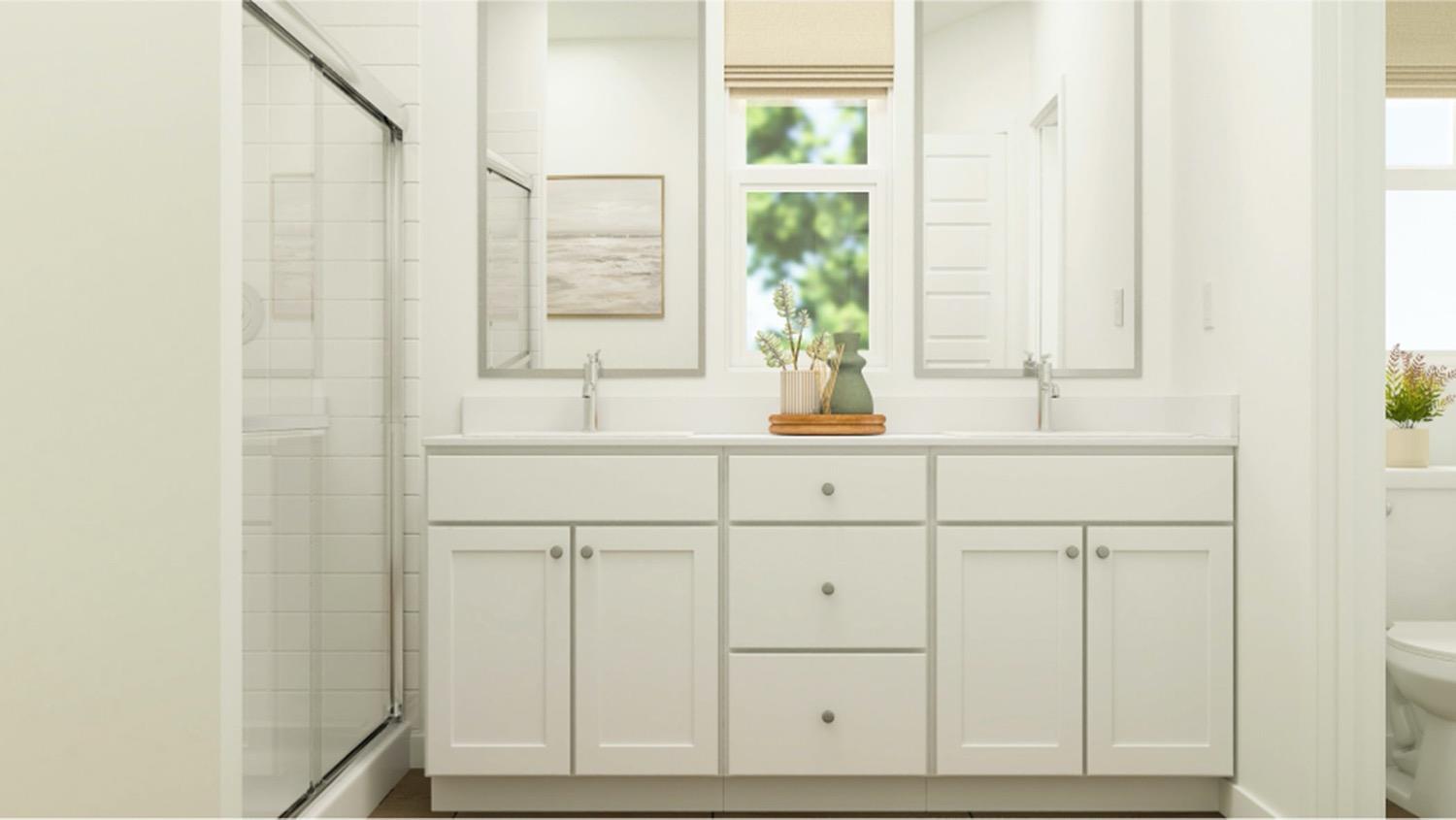 1010 Springtime Avenue, Unit 130 Clovis, CA 93619 - Photo 13 of 18 a bathroom with a sink and a mirror