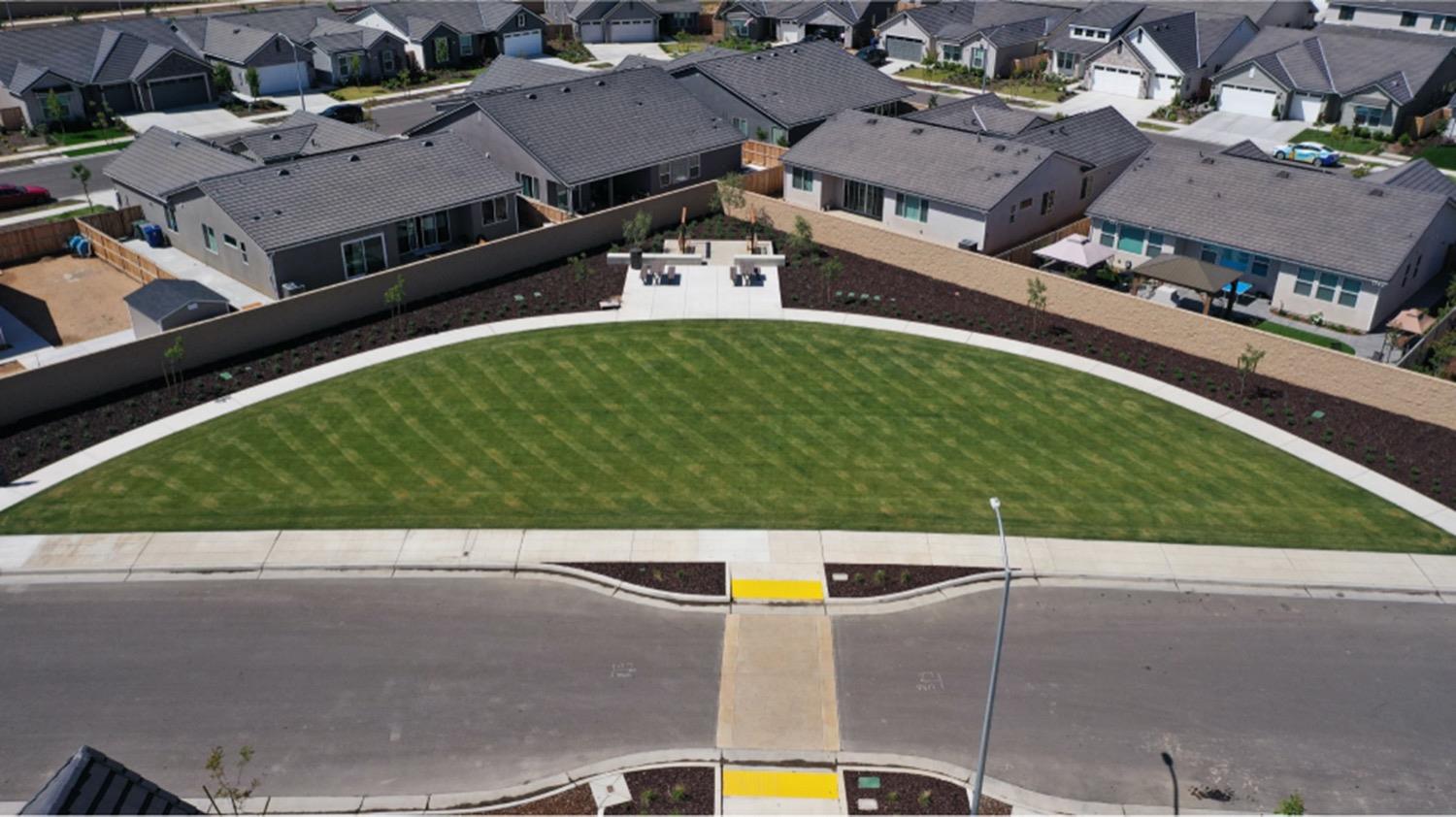 1010 Springtime Avenue, Unit 130 Clovis, CA 93619 - Photo 18 of 18 an aerial view of a house with a yard