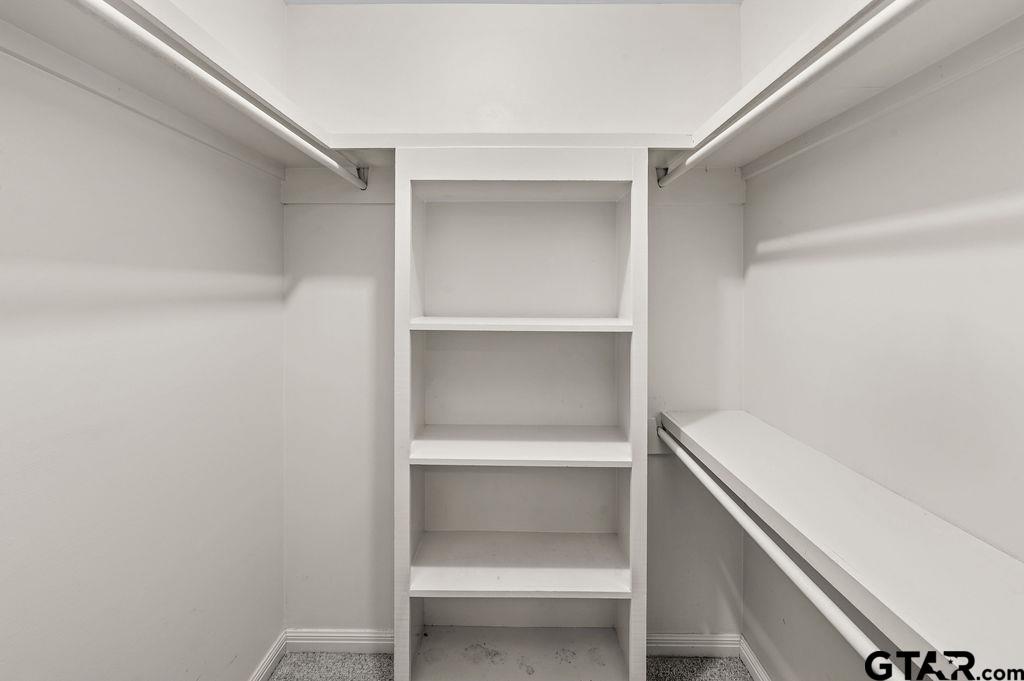 610 Tamy Street Quitman, TX 75783 - Photo 17 of 29 a view of an empty walk in closet