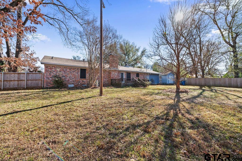 610 Tamy Street Quitman, TX 75783 - Photo 25 of 29 a house with trees in front of it
