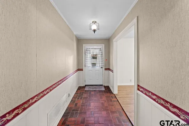 a view of a livingroom with wooden floor