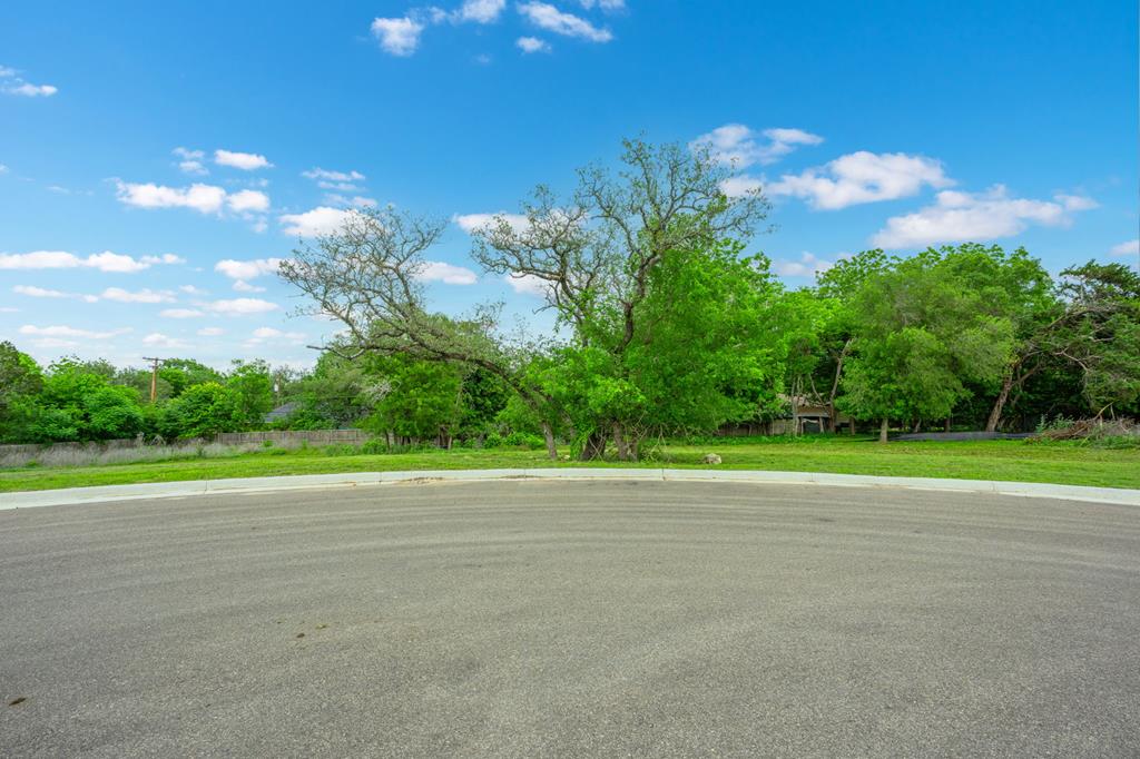 523 Conner Court Kerrville, TX 78028 - Photo 1 of 9 a view of a playground and basketball court