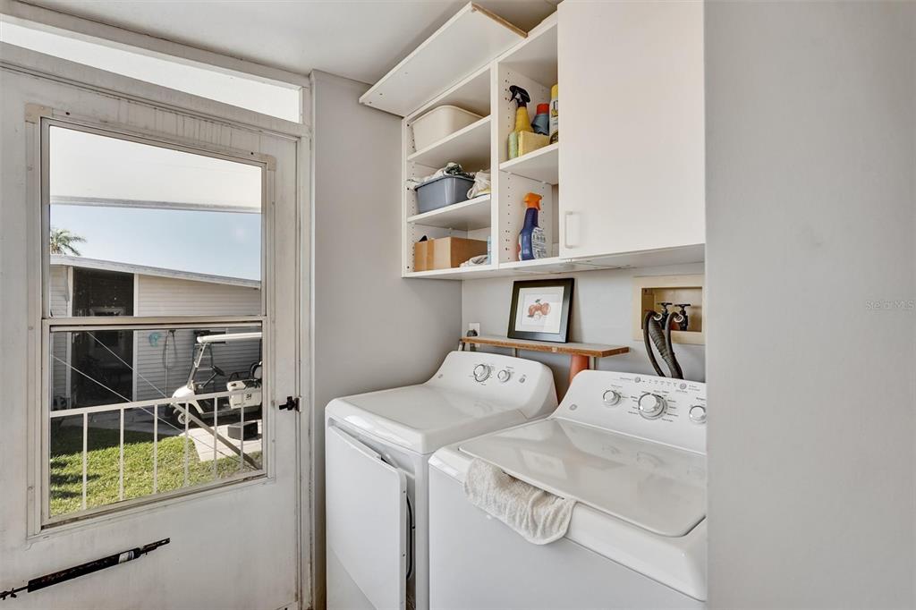 10315 Cortez Road West, Unit 19H Bradenton, FL 34210 - Photo 17 of 47 a utility room with dryer and washer