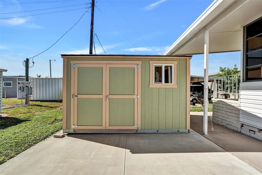 10315 Cortez Road West, Unit 19H Bradenton, FL 34210 - Photo 28 of 47 a front view of a house with a garden