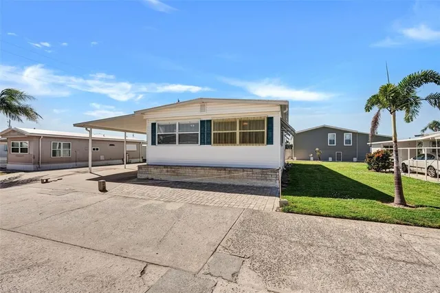 a house view with a garden space