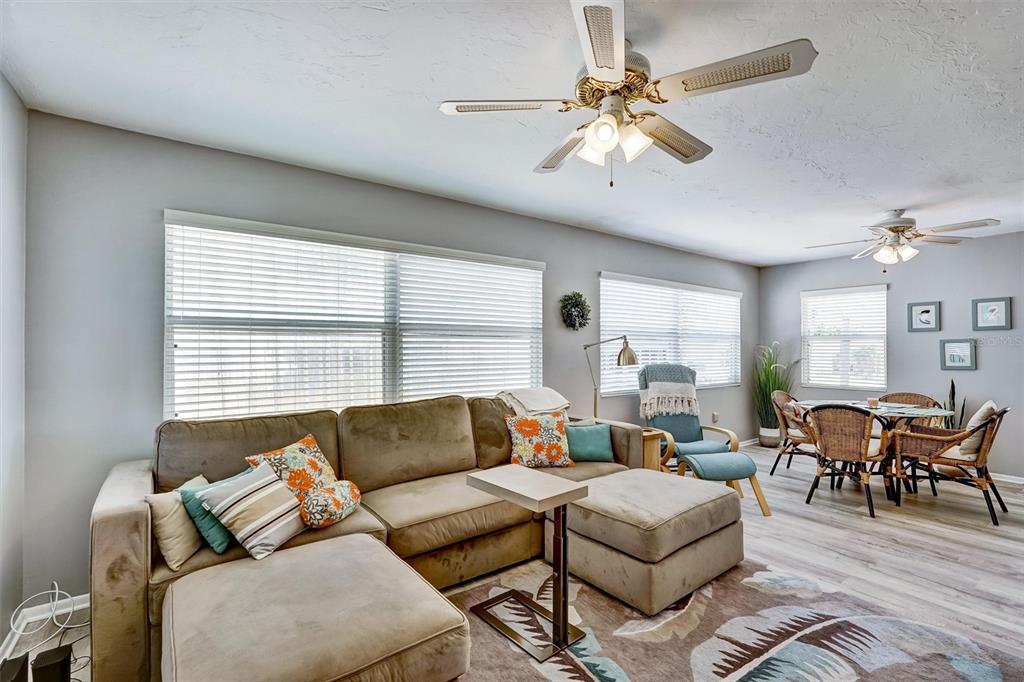 10315 Cortez Road West, Unit 19H Bradenton, FL 34210 - Photo 8 of 47 a living room with furniture and a large window