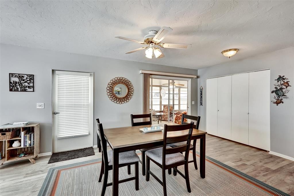 10315 Cortez Road West, Unit 19H Bradenton, FL 34210 - Photo 10 of 47 a dining room with furniture and window