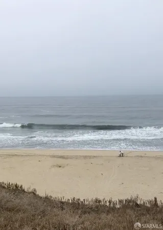 a view of beach and ocean