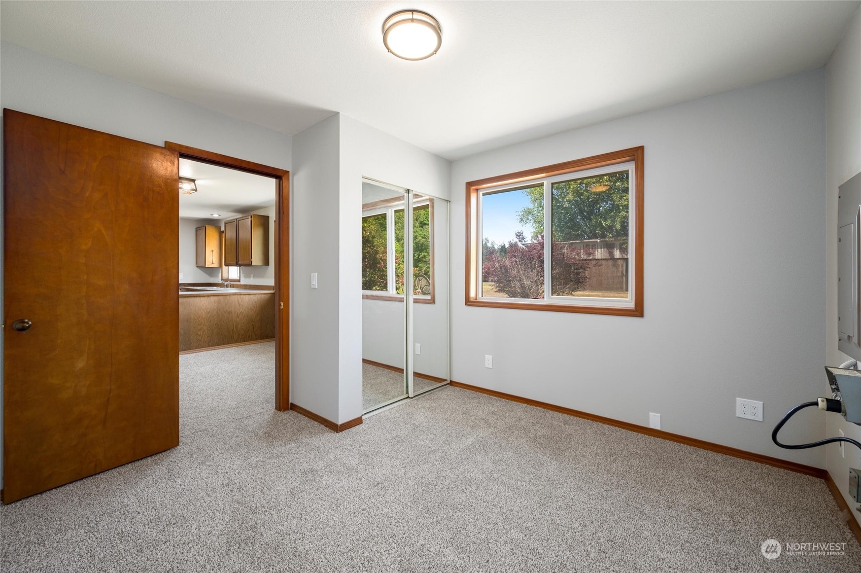 8879 Stein Road Custer, WA 98240 - Photo 13 of 22 an empty room with windows & cabinet