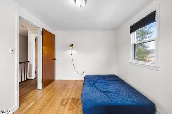 a view of a storage & utility room with washer and dryer