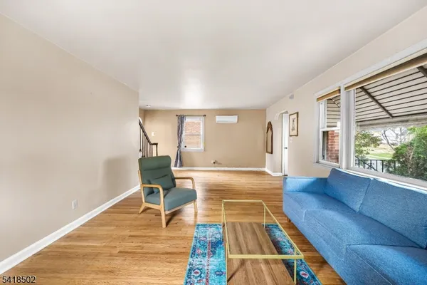 a room with furniture and a window