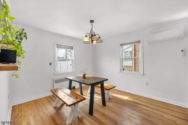 a kitchen with a stove sink and cabinets