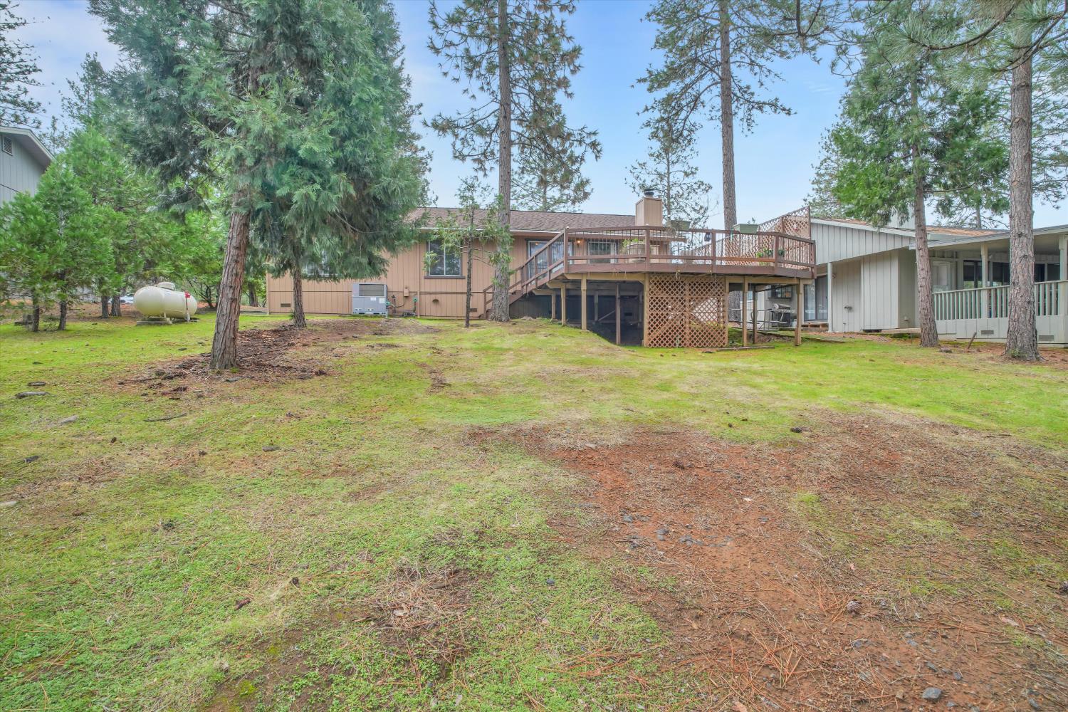 12066 Breckenridge Road Groveland, CA 95321 - Photo 30 of 41 a view of a house with a outdoor space