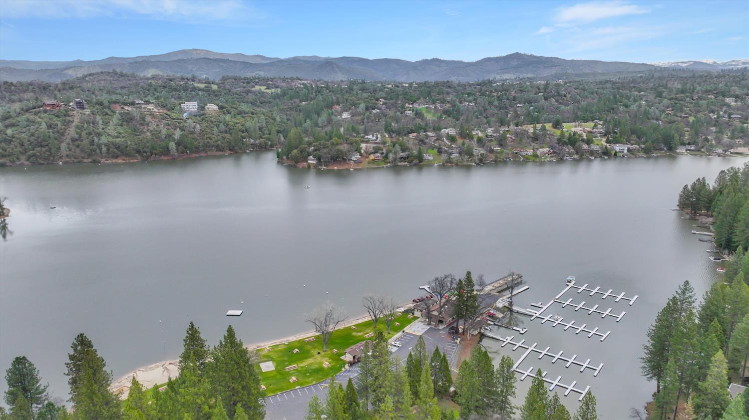 12066 Breckenridge Road Groveland, CA 95321 - Photo 36 of 41 a view of a lake with a mountain