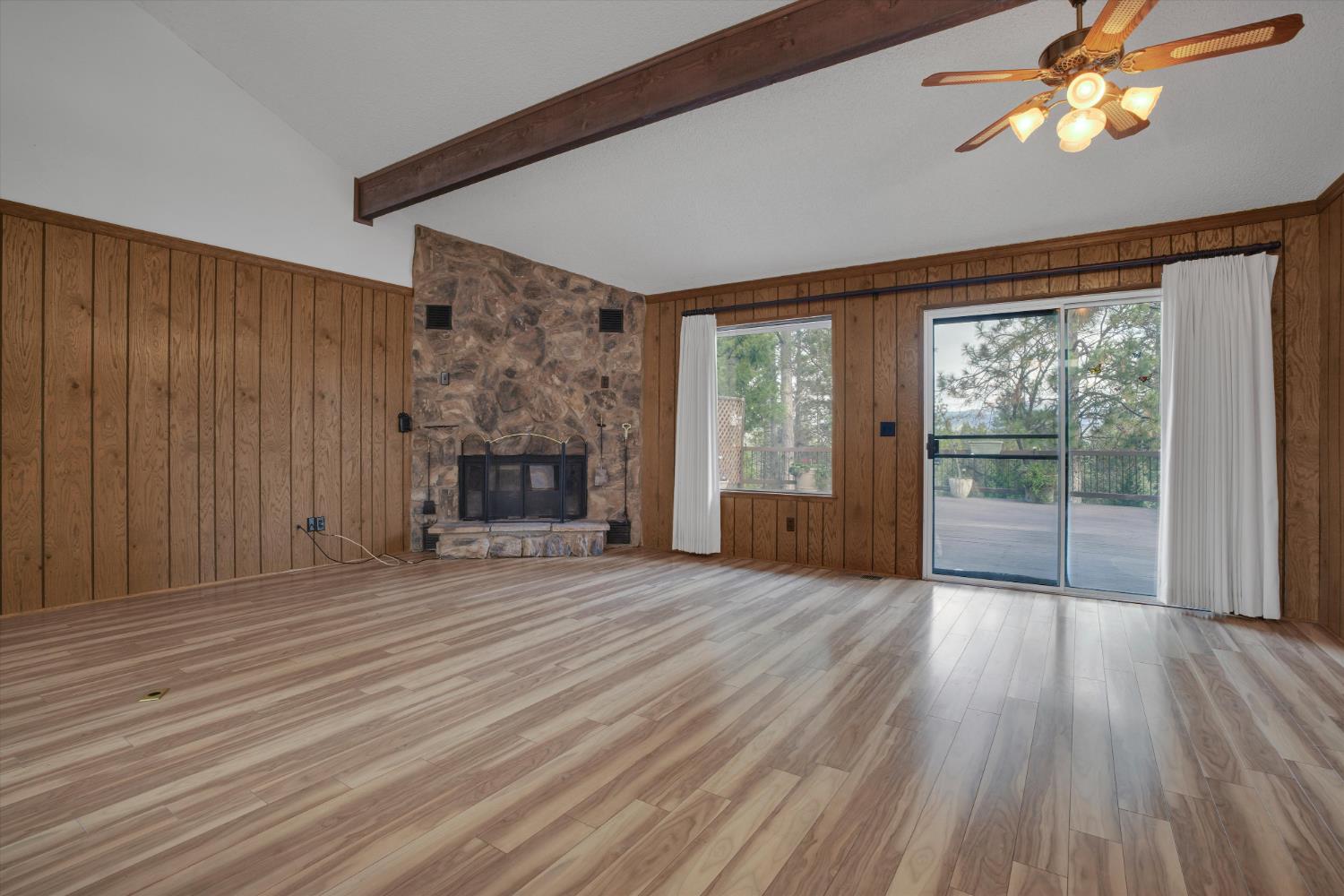 12066 Breckenridge Road Groveland, CA 95321 - Photo 6 of 41 wooden floor fireplace and windows in an empty room