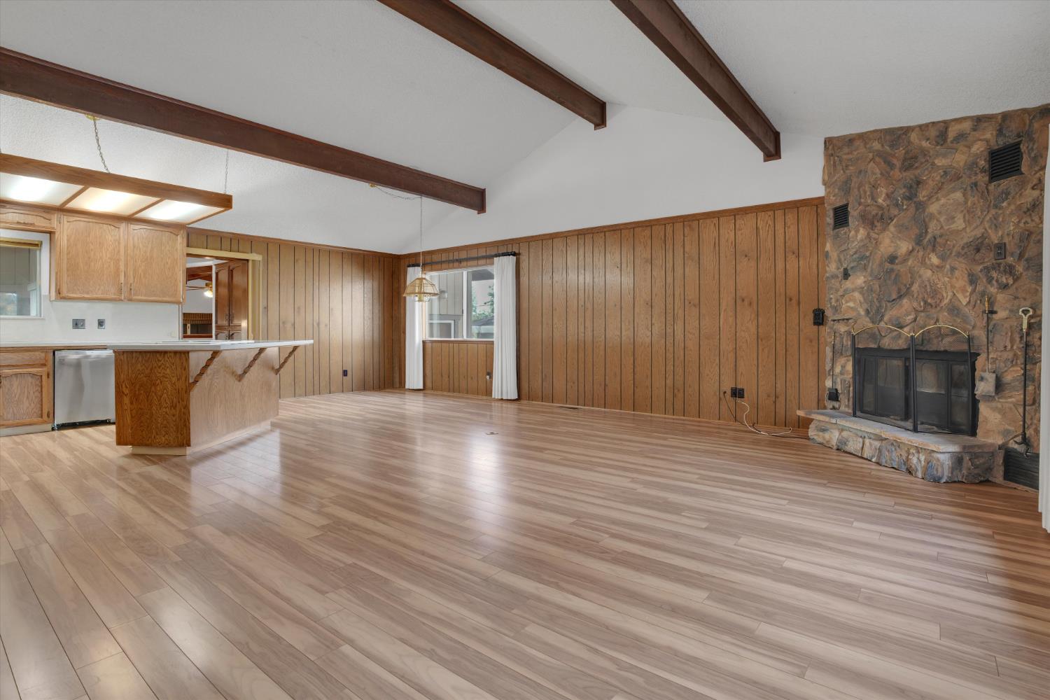 12066 Breckenridge Road Groveland, CA 95321 - Photo 7 of 41 a view of a livingroom with furniture and a fireplace