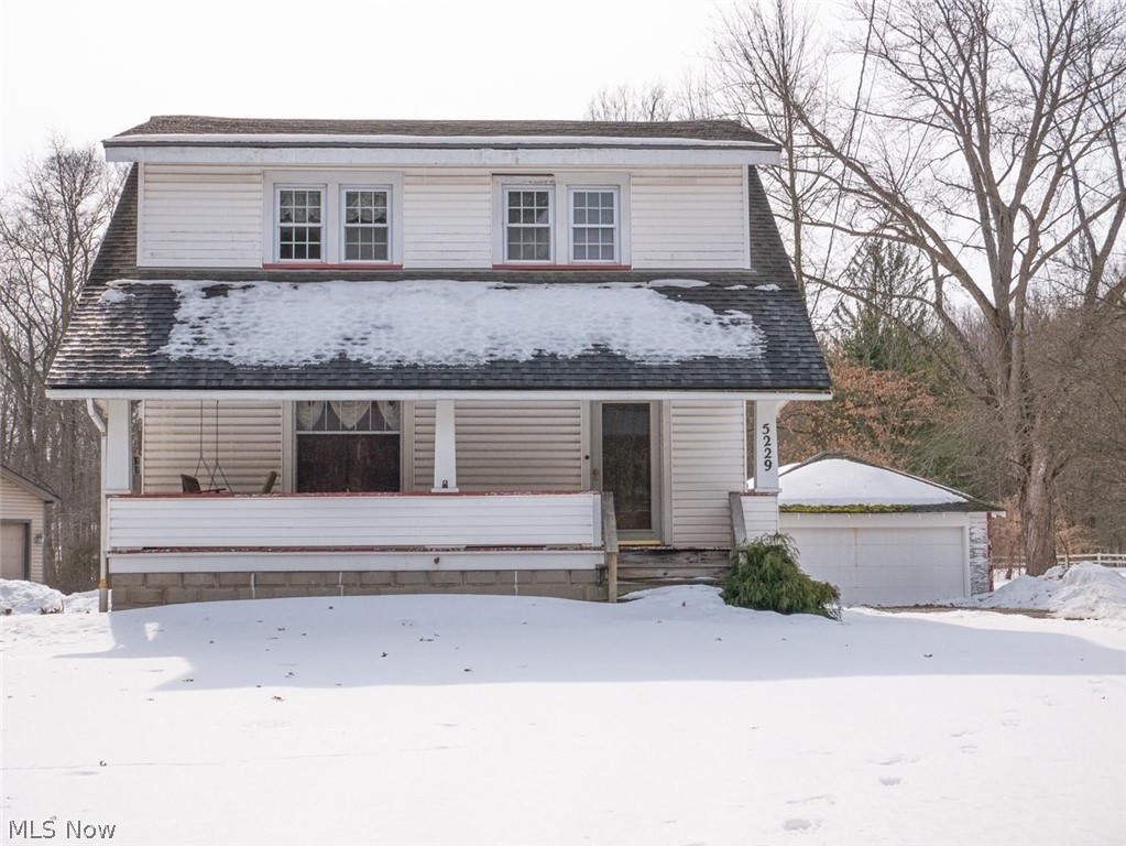 5229 Shields Road Canfield, OH 44406 - Photo 1 of 28 25 x 7 covered front porch, roof is 12 yrs old, beautiful wood and glass front door