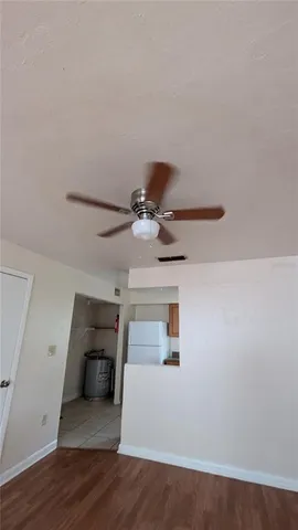 a view of a livingroom with wooden floor