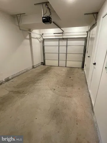 a view of an empty room with a flat screen tv