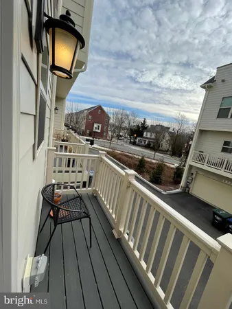 a balcony with view of city