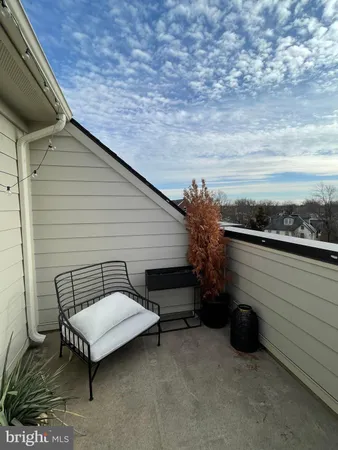 a view of a terrace with a bench