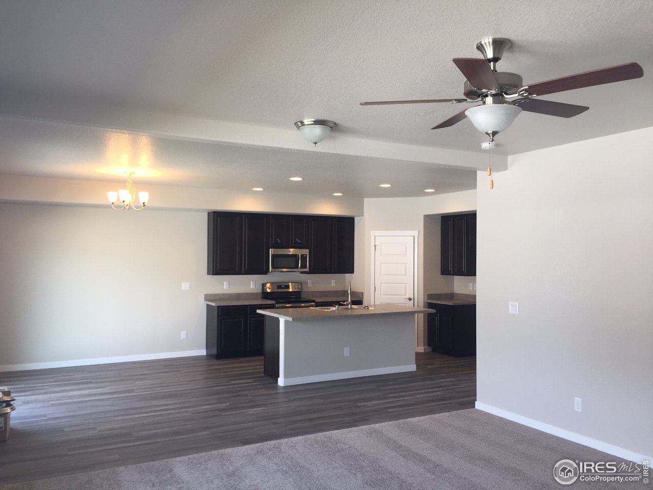 8645 16th St Road Greeley, CO 80634 - Photo 6 of 16 Open kitchen and large dining