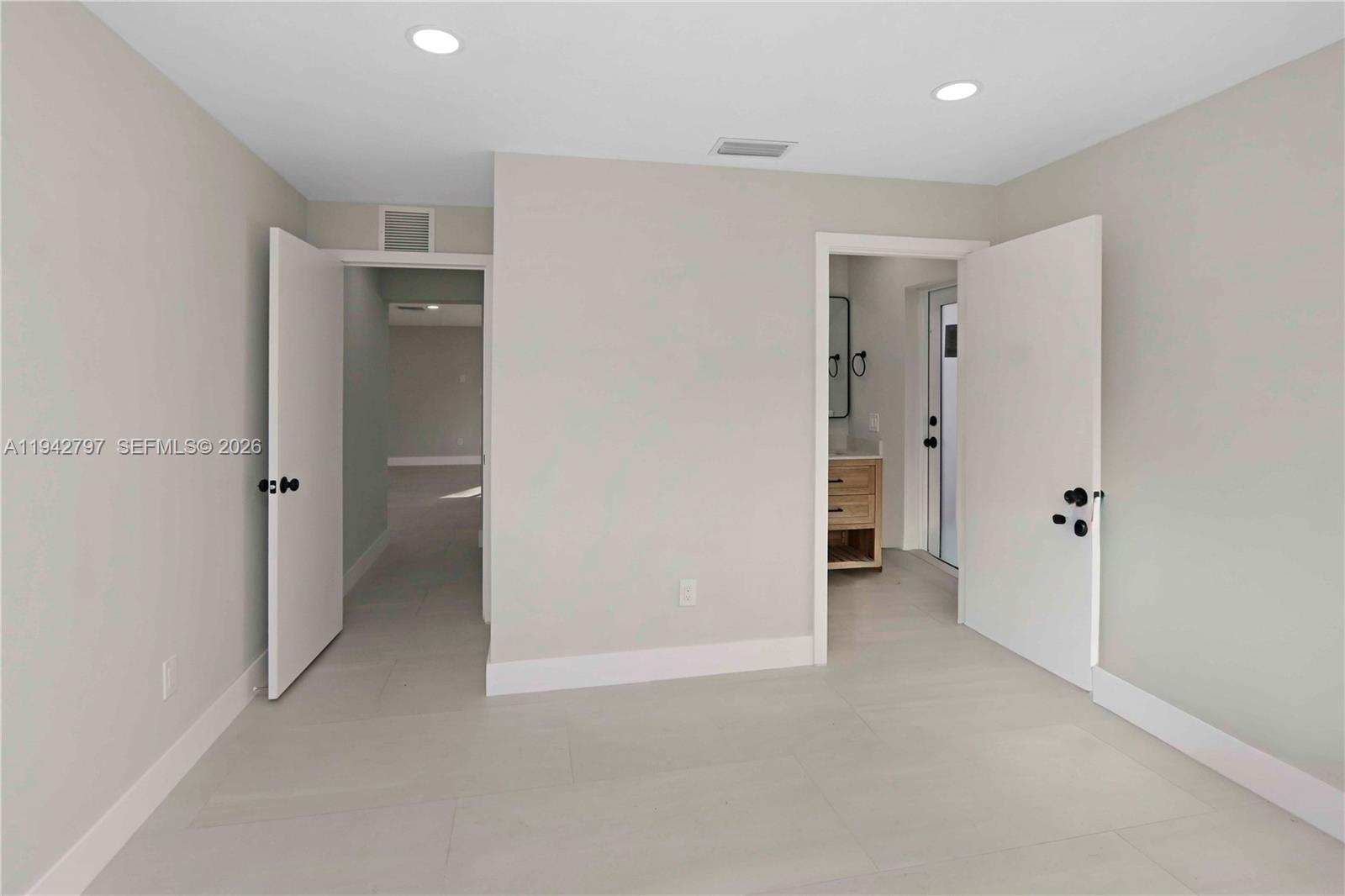 16232 Southwest 107th Court Miami, FL 33157 - Photo 12 of 32 wooden floor and closet in a room