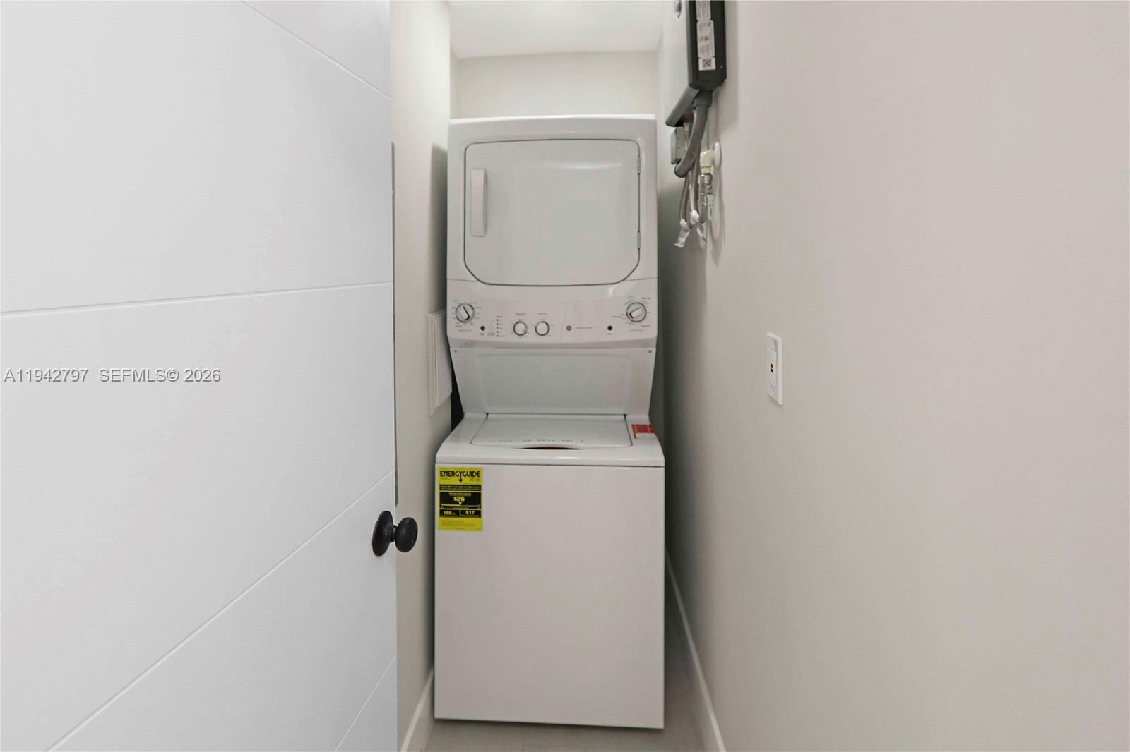 16232 Southwest 107th Court Miami, FL 33157 - Photo 15 of 32 a utility room with dryer and washer
