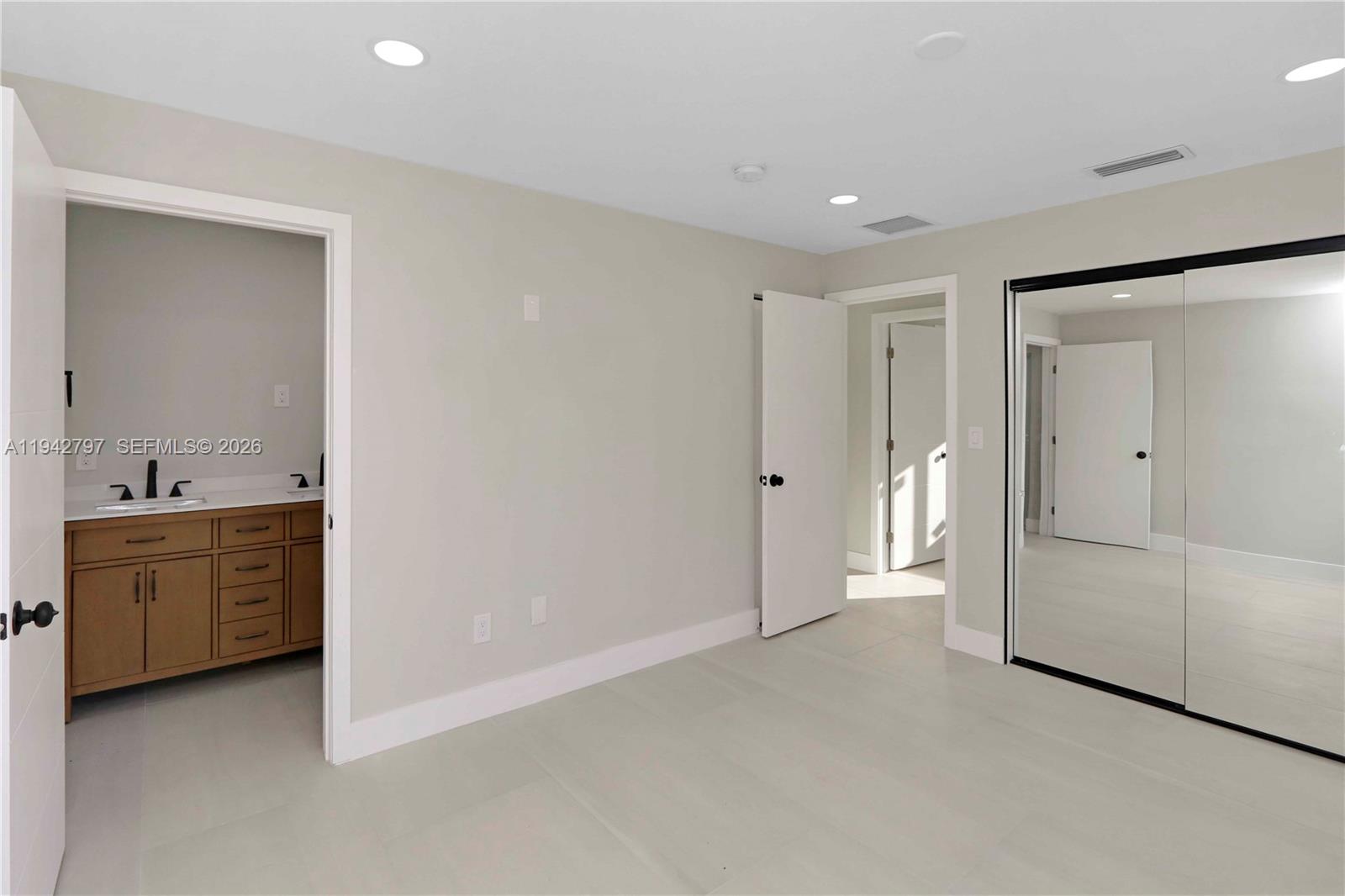 16232 Southwest 107th Court Miami, FL 33157 - Photo 22 of 32 a view of an empty room and window
