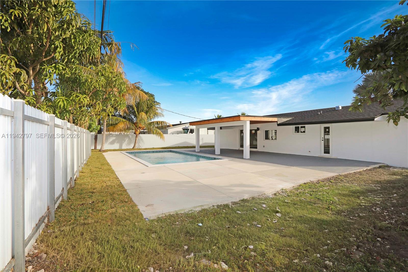 16232 Southwest 107th Court Miami, FL 33157 - Photo 28 of 32 a view of backyard of a house