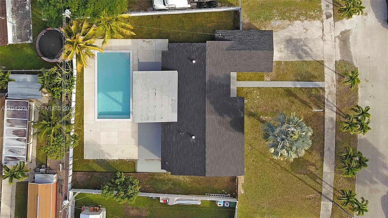 16232 Southwest 107th Court Miami, FL 33157 - Photo 3 of 32 aerial view of a house with yard swimming pool and outdoor seating
