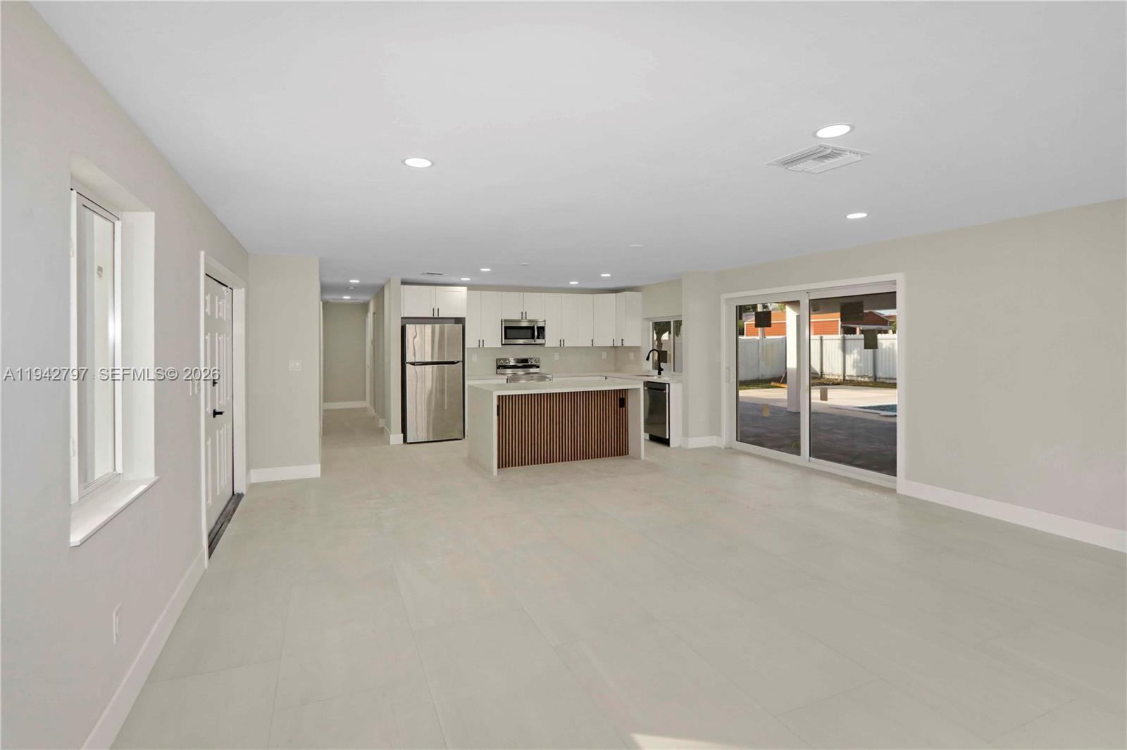 16232 Southwest 107th Court Miami, FL 33157 - Photo 10 of 32 a big room with closet and windows