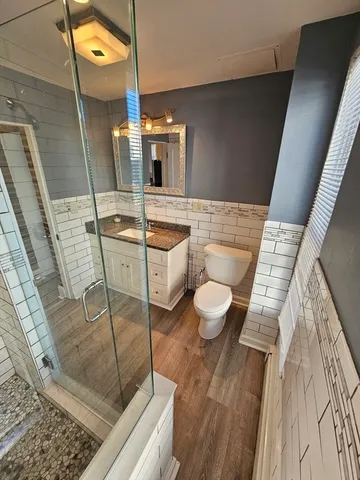 a bathroom with a sink and a washing machine