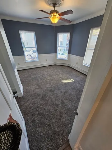 a view of an empty room and window