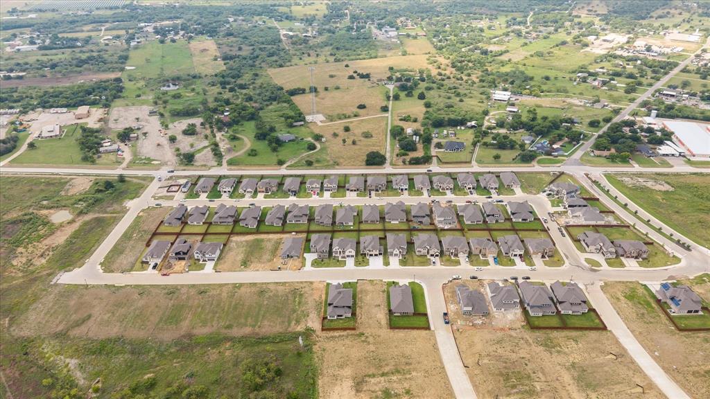 3748 Old Fort Worth Road Midlothian, TX 76065 - Photo 11 of 40 Much wider aerial shot from the front of the property. Westside Preserve neighborhood still expanding.