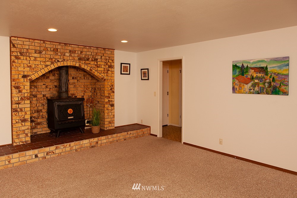 17979 Bennett Road Mount Vernon, WA 98273 - Photo 14 of 28 a view of an empty room with a fireplace