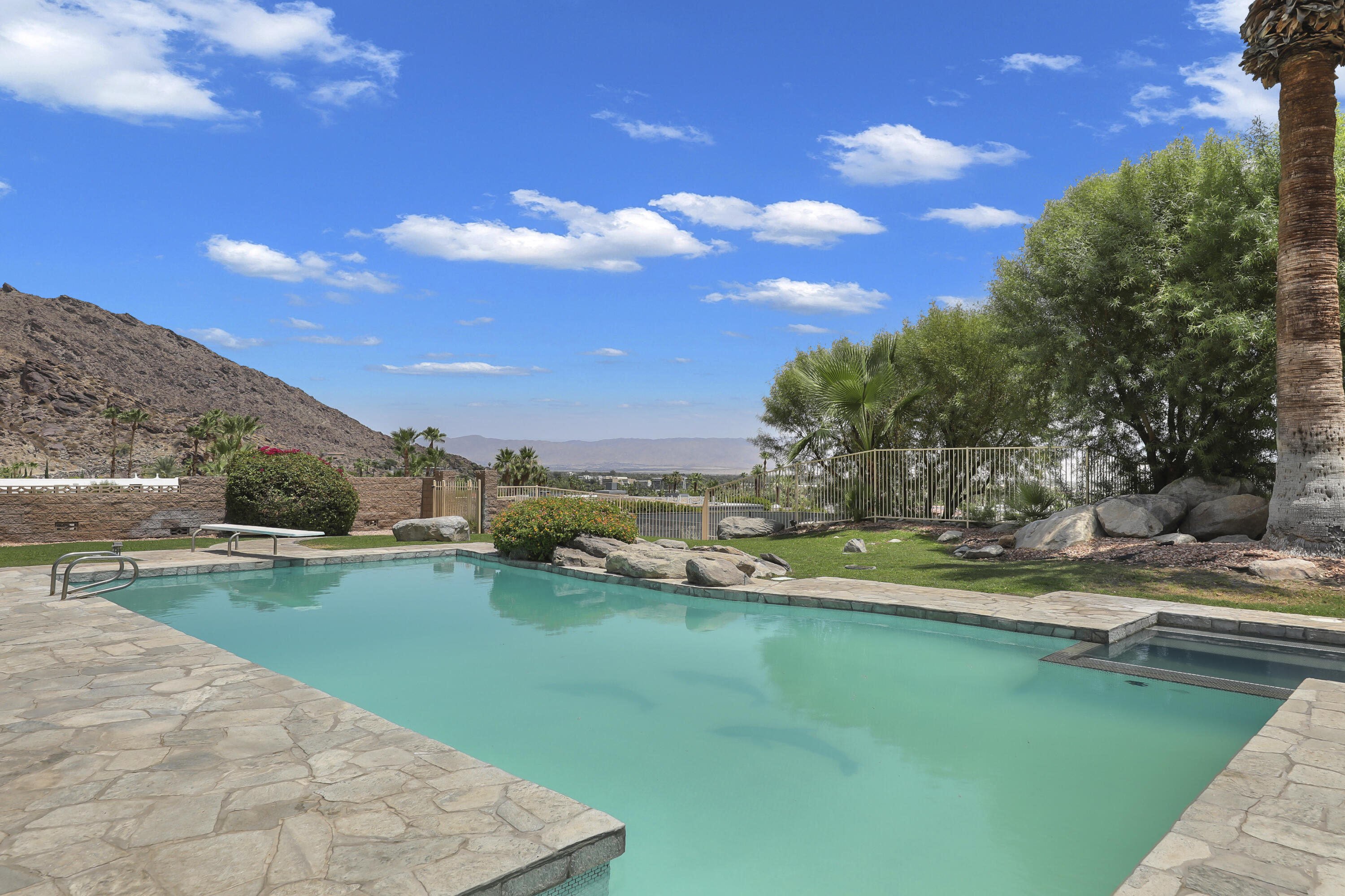 770 South La Mirada Road Palm Springs, CA 92264 - Photo 26 of 39 a view of a garden with lawn chairs