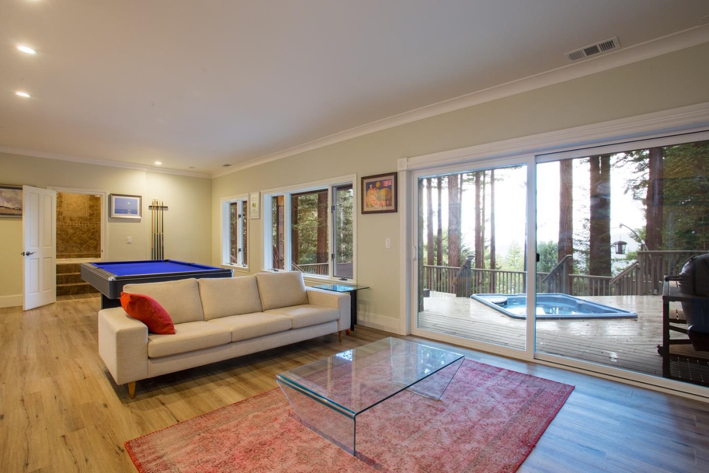 234 Swett Road Woodside, CA 94062 - Photo 16 of 20 a living room with furniture and a large window